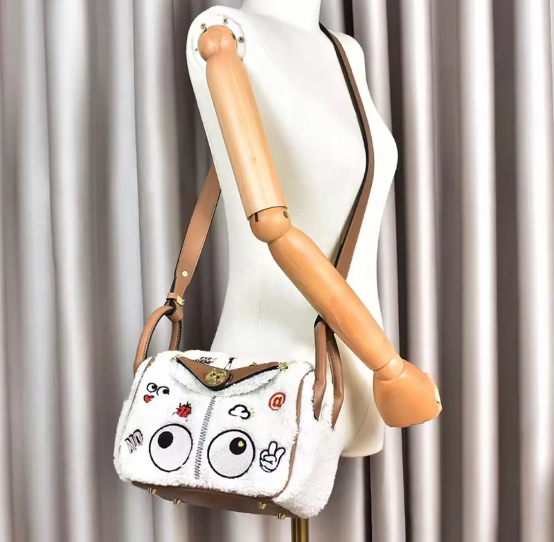 Lindy Eye Theme Faux Sheep Bag
